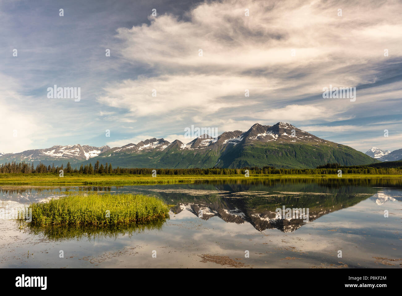 Reflection of Chugach Mountains in Robe Lake near Valdez in Southcentral Alaska. Stock Photo