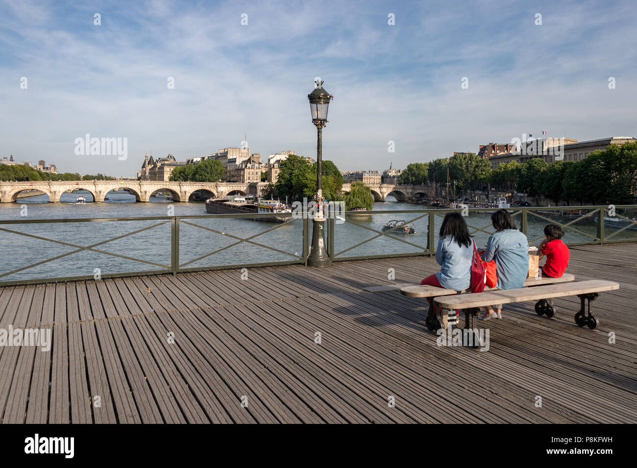 Paris 24 June 18 Tourists Enjoying The View From Pont Des Arts Bridge Stock Photo Alamy
