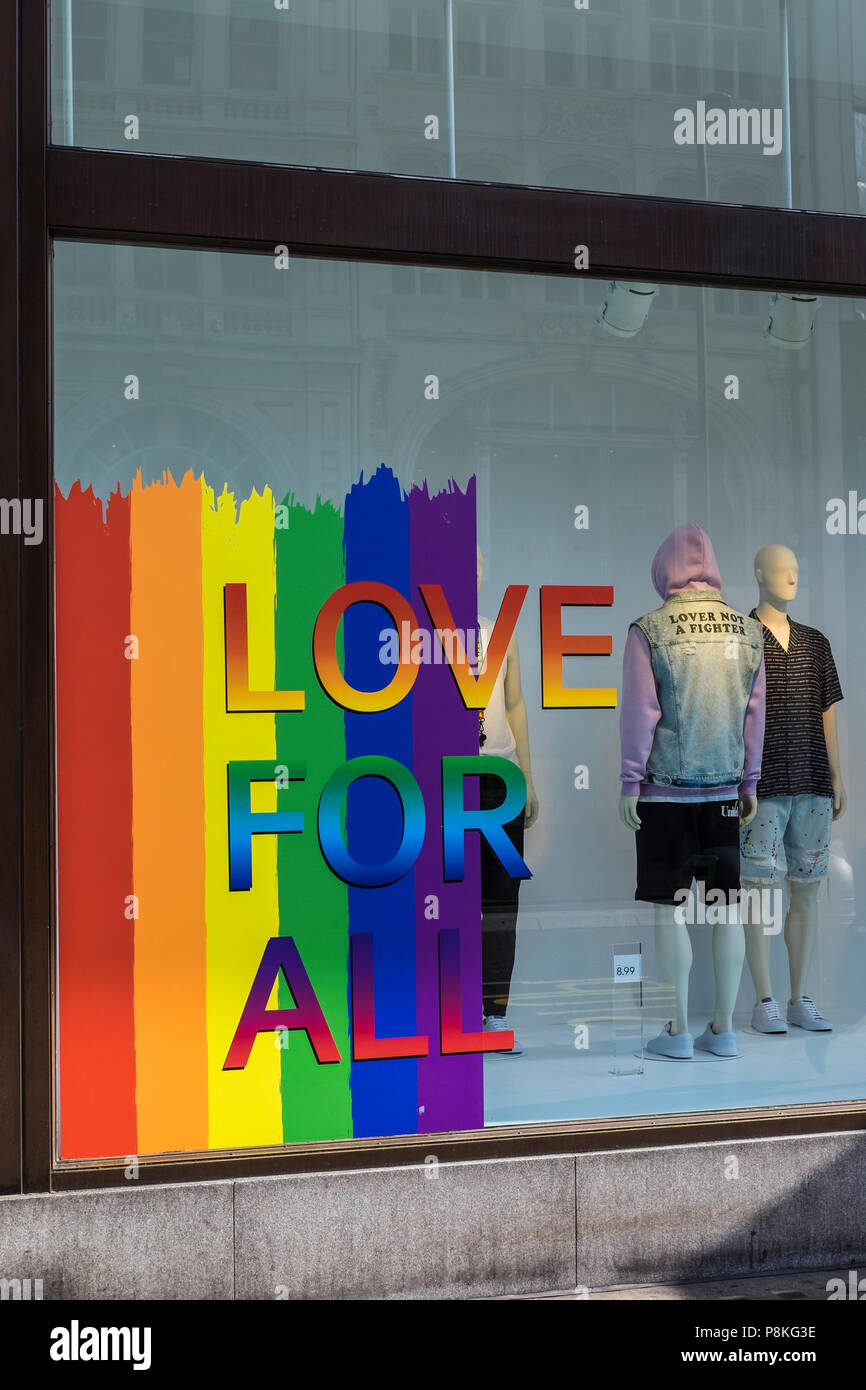Shop window display supporting Pride, Oxford Street, London, England, U