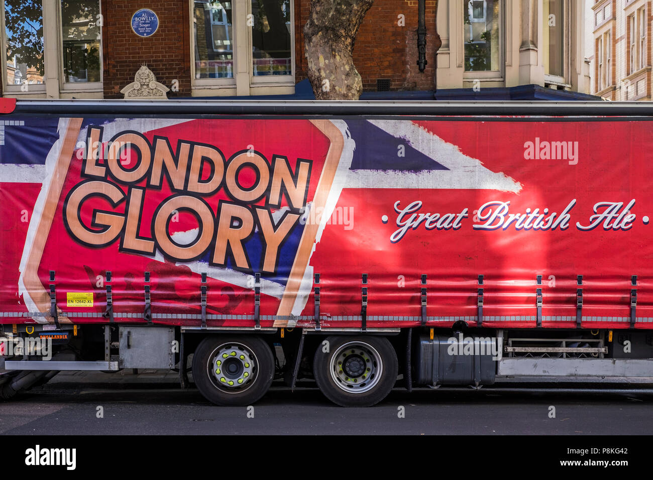 Greene King beer lorry making delivery, London, England, U.K. Stock Photo