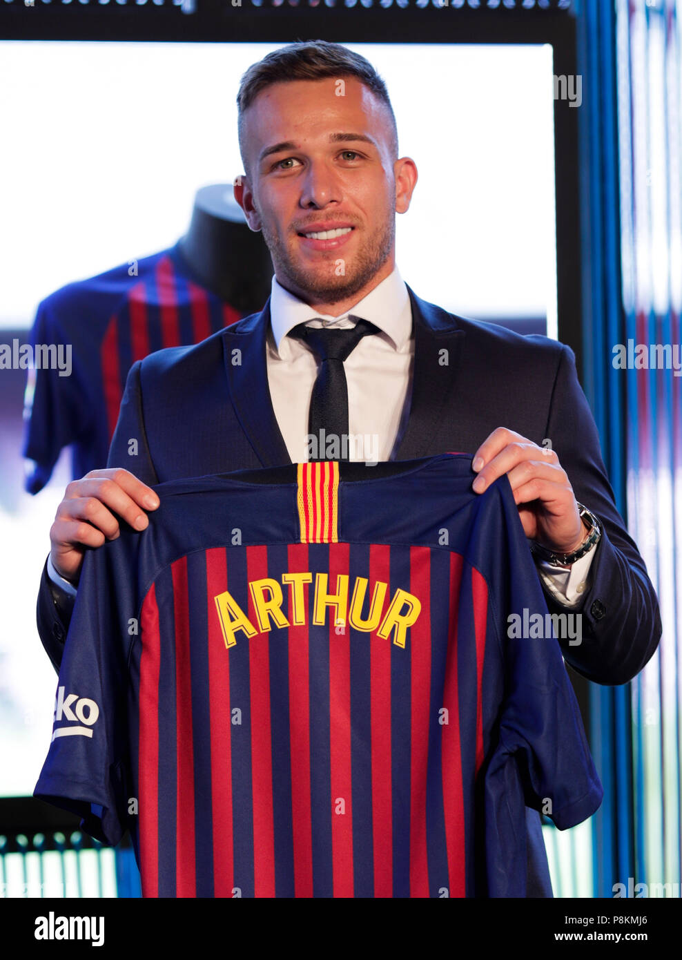 Camp Nou, Barcelona, Spain. 12th July, 2018. FC Barcelona press conference  to unveil new signing, Arthur Melo poses with his new shirt Credit: Action  Plus Sports/Alamy Live News Stock Photo - Alamy