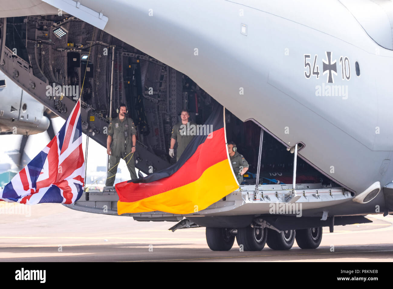 RAF Fairford, Gloucestershire, UK. 12th July 2018. The Royal International Air Tattoo. German Air Force crew flying flags Stock Photo
