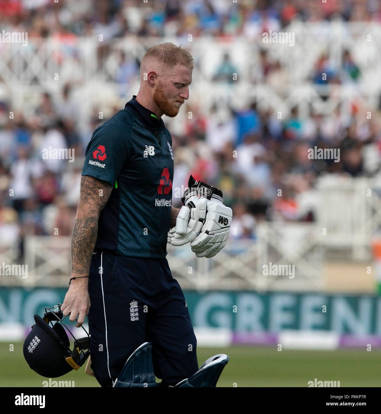Nottingham, UK. 12th July 2018, Royal London, One Day International, England v India, Trent Bridge, Ben Stokes leaves the field after being caught off the bowling of Kuldeep Yadav for 50 Credit: David Kissman/Alamy Live News Stock Photo