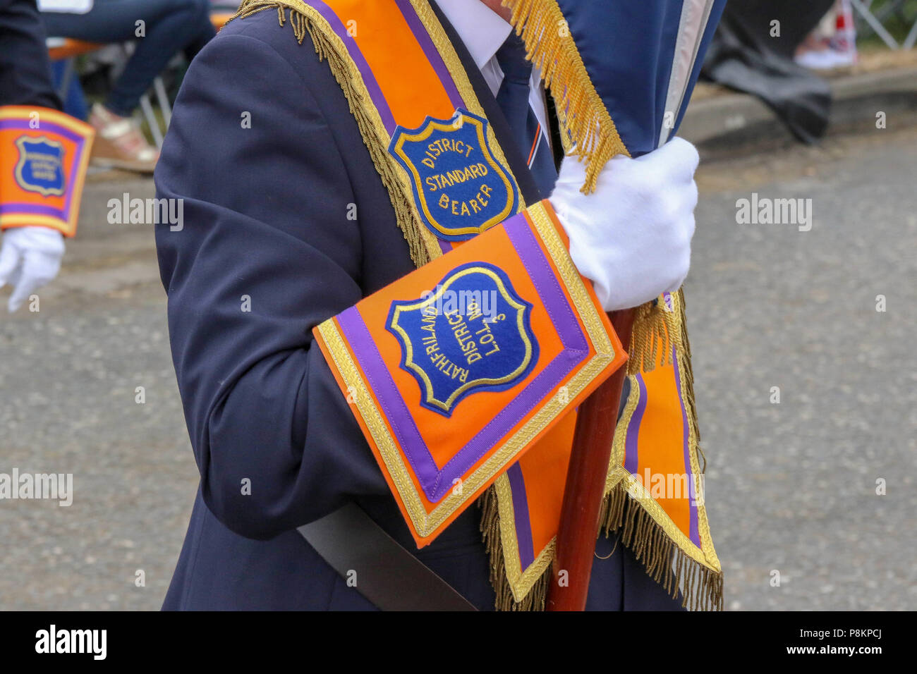 Donaghcloney, County Down, Northern Ireland.12 July 2018. Orange order parade on 12th July in Northern Ireland. The Twelfth of July is marked by Orange Order parades across Northern Ireland. The largest parade in County Down this year was at Donaghcloney. Thousands turned out to see the parade through the village. The parades across Northern Ireland mark the victory of William of Orange over James at the Battle of the Boyne in 1690. Thousands turned out to watch the colourful parade at Donaghcloney. Credit: CAZIMB/Alamy Live News. Stock Photo