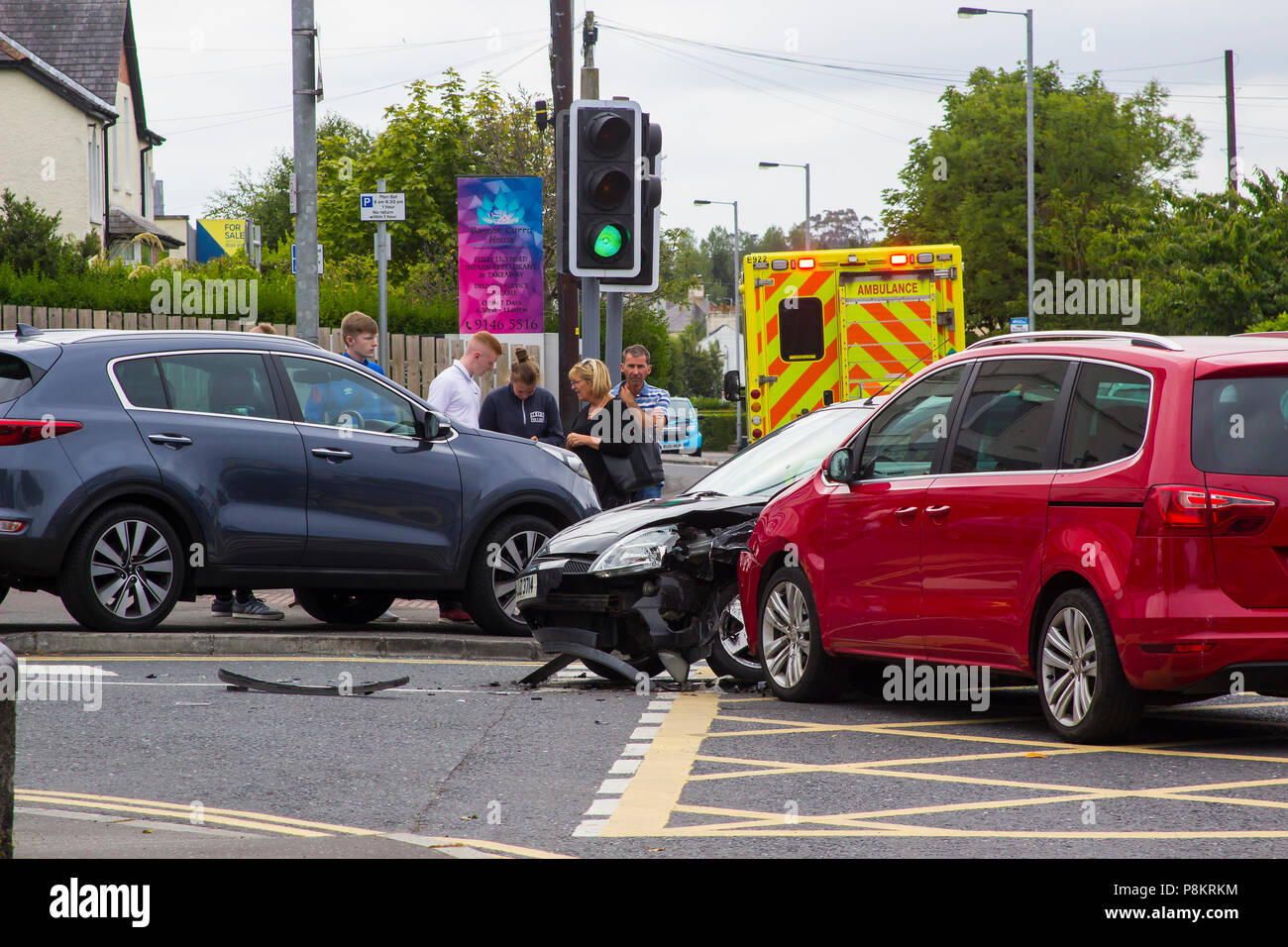 Ballyholme, Northern Ireland. 12th July 2018. A multi vehicle road traffic accident at Ballyholme in Bangor County Ddown Northern Ireland with two ambulances in attendance. details of any injured persons are not yet available but the image shows extensive damge to vehichles with one having mounted the pavement at the entrance to the Windmill Road Credit: MHarp/Alamy Live News Stock Photo