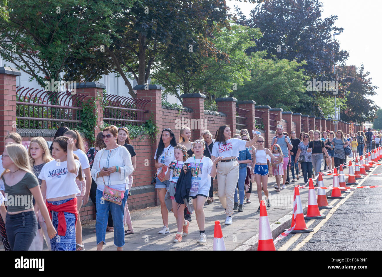 Northampton. U.K. 12th July 2018. Little Mix, The Summer Hits Tour 2018  a sell-out councert at the County Ground, Northamptonshire County Cricket Club the queues in Abington Avenue were let into the venue early because of the heat and the organisers not wanting people fainting out in the street. Credit: Keith J Smith./Alamy Live News Stock Photo
