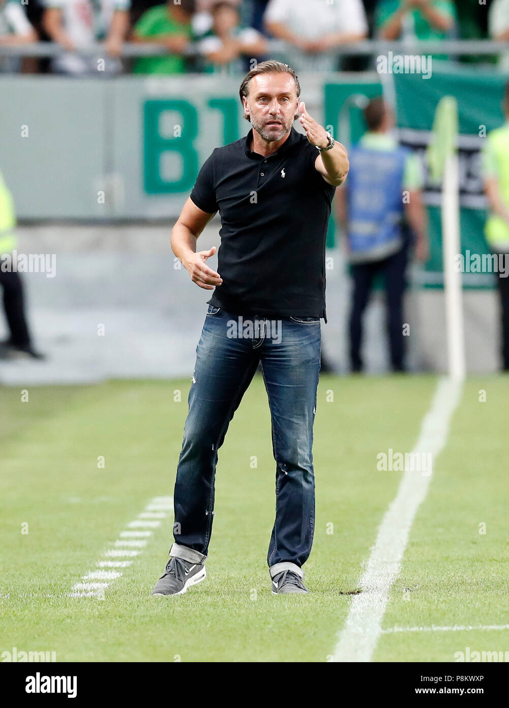 BUDAPEST, HUNGARY - JULY 24, 2014: Head Coach Of FTC, Thomas Doll During Ferencvarosi  TC Vs. HNK Rijeka UEFA EL Football Match At Puskas Stadium On July 24, 2014  In Budapest, Hungary.