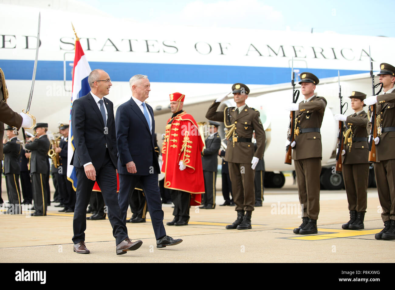 Zagreb, Croatia. 12th July, 2018. Croatian Defense Minister Damir Krsticevic (L, front) and visiting U.S. Secretary of Defense James Mattis (R, front) inspect guard of honor in Zagreb, Croatia, on July 12, 2018. James Mattis on Thursday promised to assist in modernizing Croatian armed forces. Credit: Petar Glebov/Xinhua/Alamy Live News Stock Photo