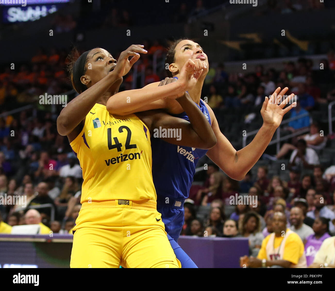 Los Angeles Sparks center Jantel Lavender 42 battling with Dallas