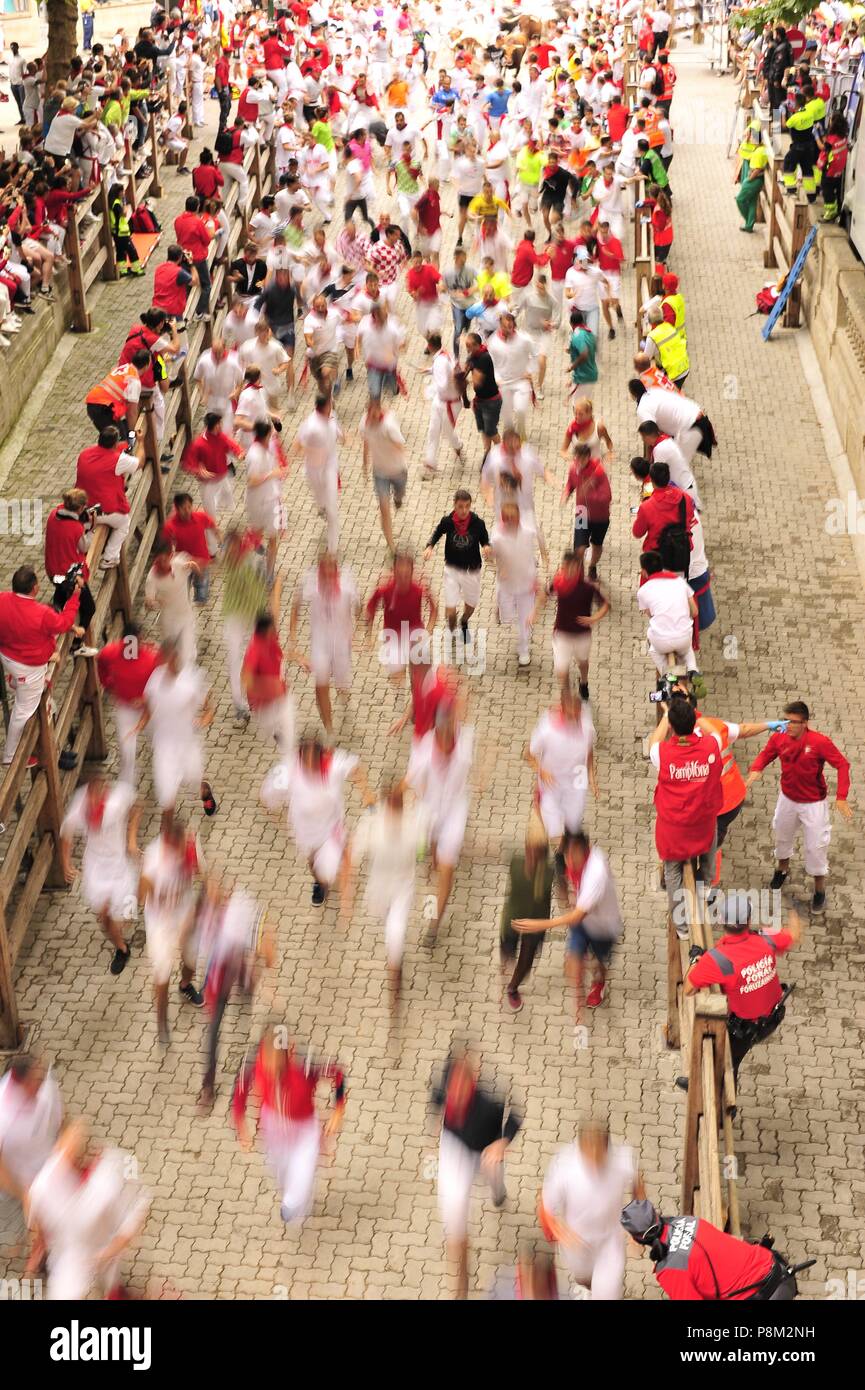 Participants run ahead of Jandilla s fighting bulls on the seventh day ...