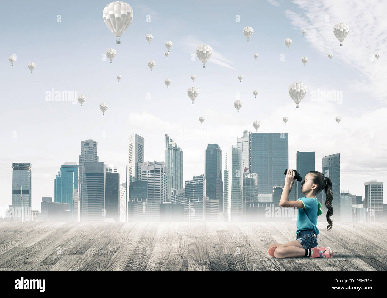 Concept of careless happy childhood with girl looking in binocul Stock ...