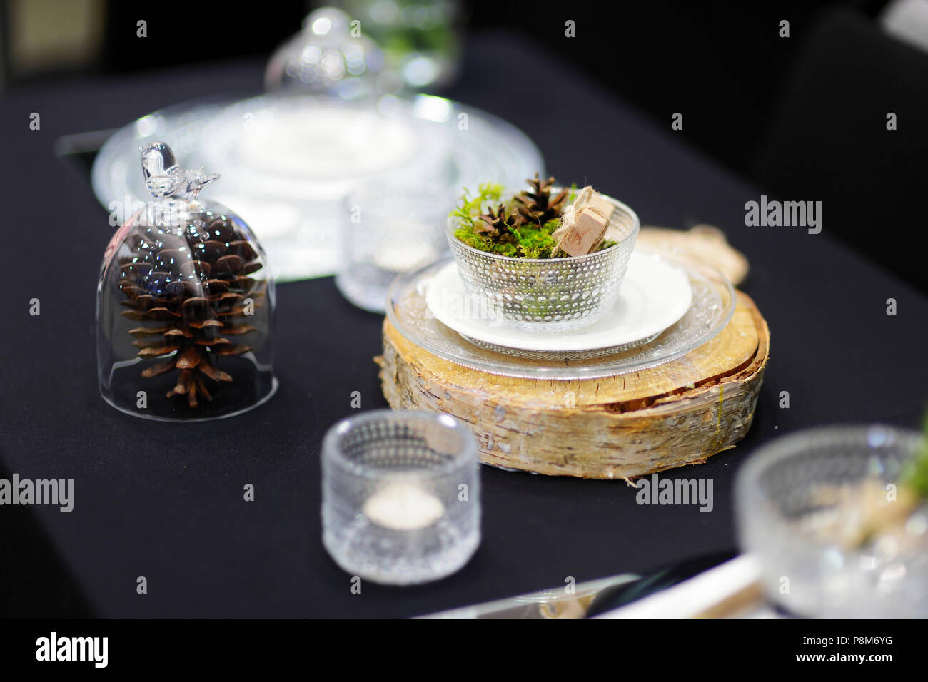 Dark table setting for an event party or wedding reception Stock Photo
