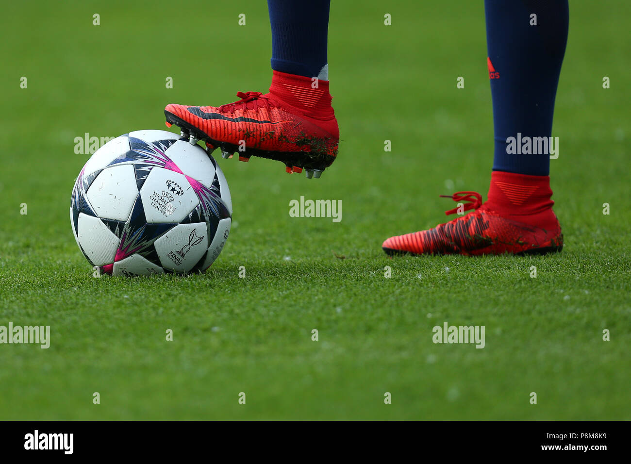 KYIV, UKRAINE - MAY 24, 2018: Close-up view of the UEFA Women's Champions  League match ball with red Nike boots of football player. Isolated at green  Stock Photo - Alamy
