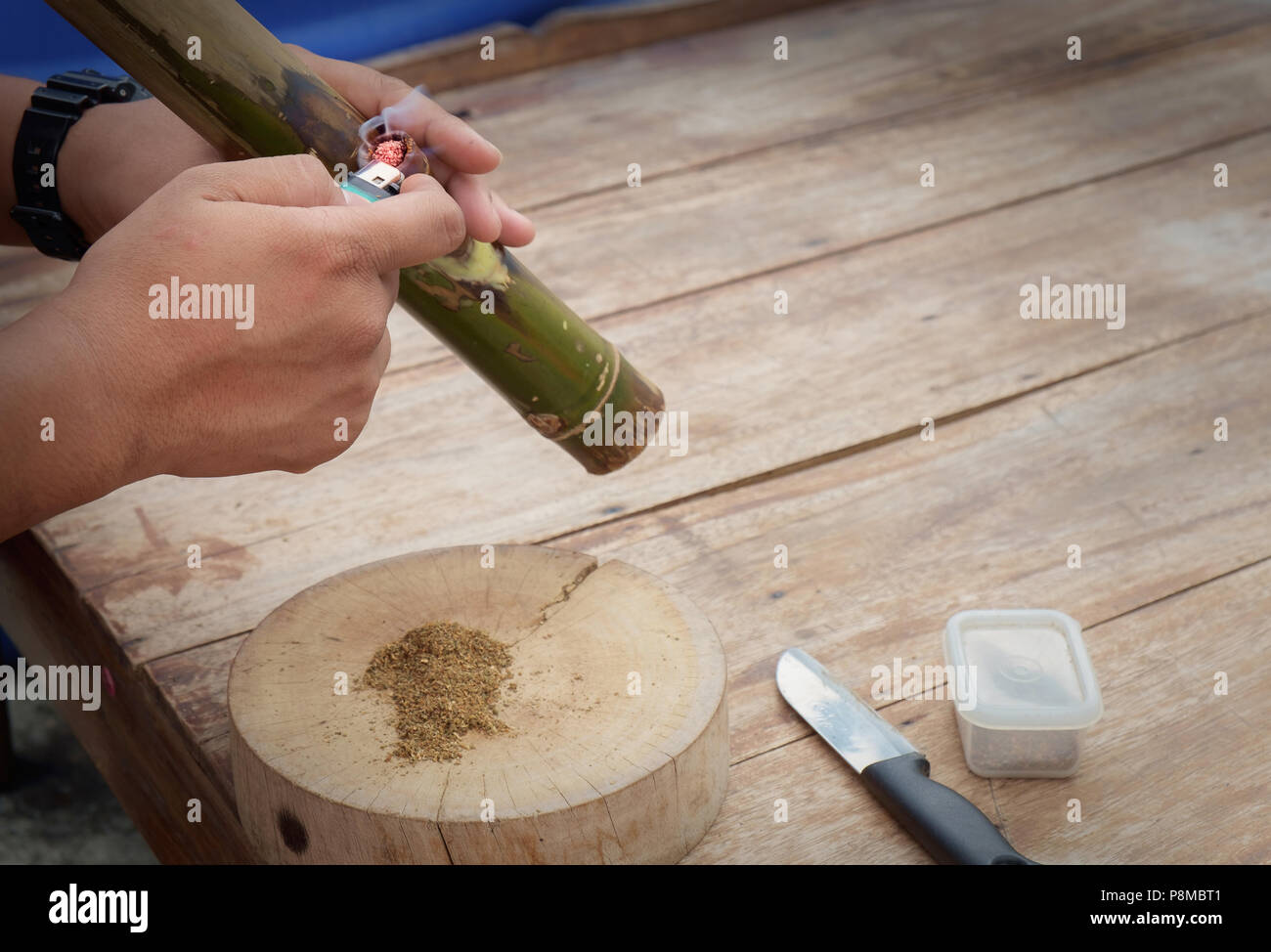 Smoking bamboo pipe hires stock photography and images Alamy
