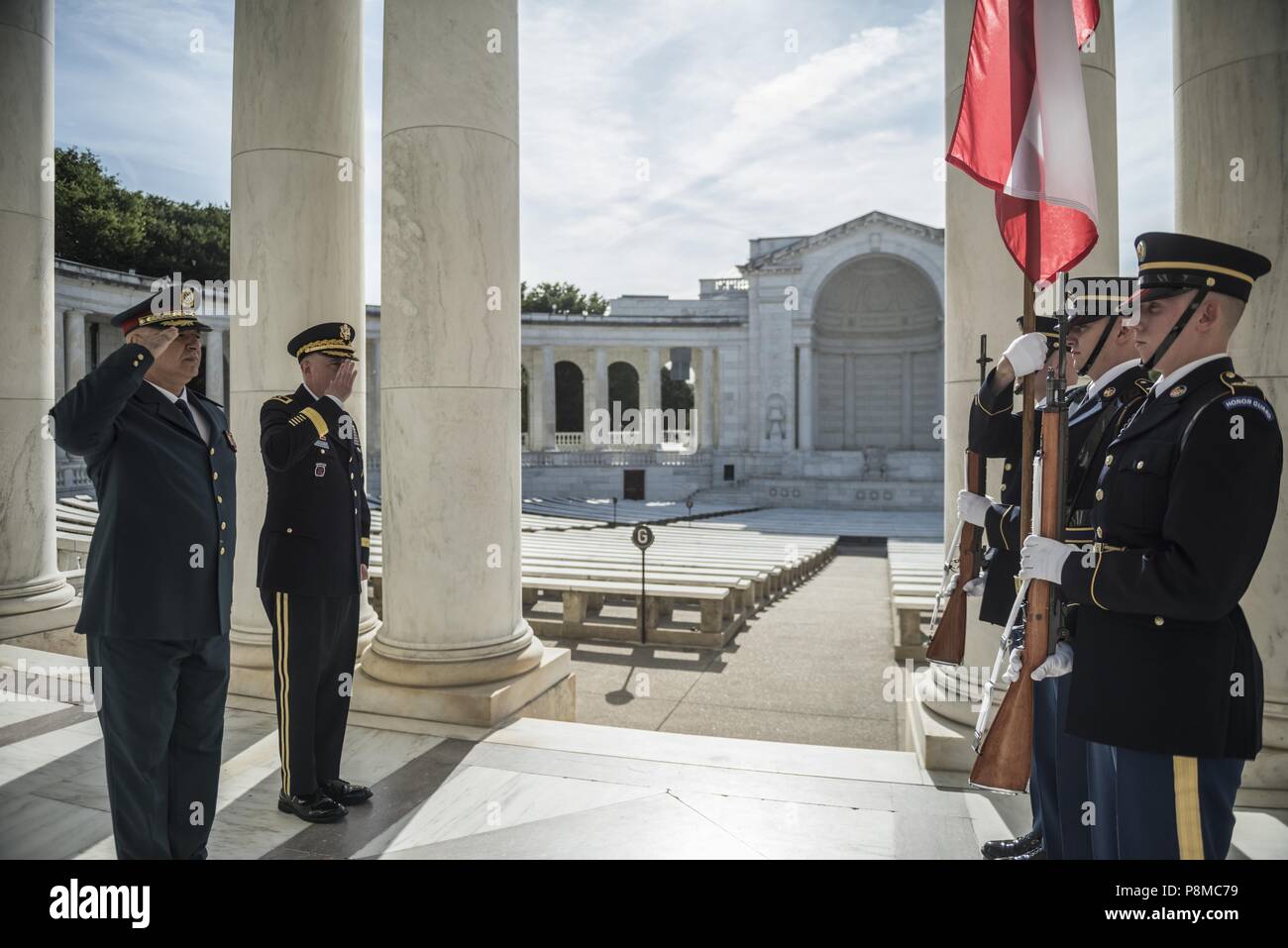 (From left to right) Gen. Joseph K. Aoun, commander, Lebanese Armed Forces, and U.S Army Maj. Gen. John P. Sullivan, assistant deputy chief of staff, G-4, render honors to the Lebanese flag in the Memorial Amphitheater at Arlington National Cemetery, Arlington, Virginia, June 26, 2018, June 26, 2018. Aoun participated in an Armed Forces Full Honors Wreath-Laying Ceremony at the Tomb of the Unknown Soldier and toured the Memorial Amphitheater Display Room as part of his visit to the cemetery. (U.S. Army photo by Elizabeth Fraser / Arlington National Cemetery / released). () Stock Photo