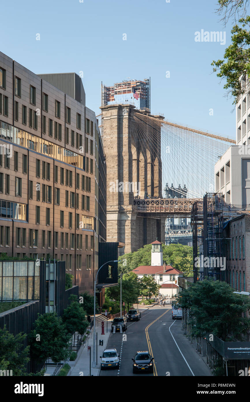 New York, City / USA - JUL 10 2018: 1 Hotel and Brooklyn Bridge in daylight view from Brooklyn Heights neighborhood Stock Photo