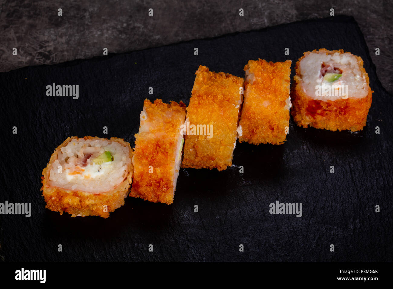 Japanese baked roll with rice Stock Photo - Alamy