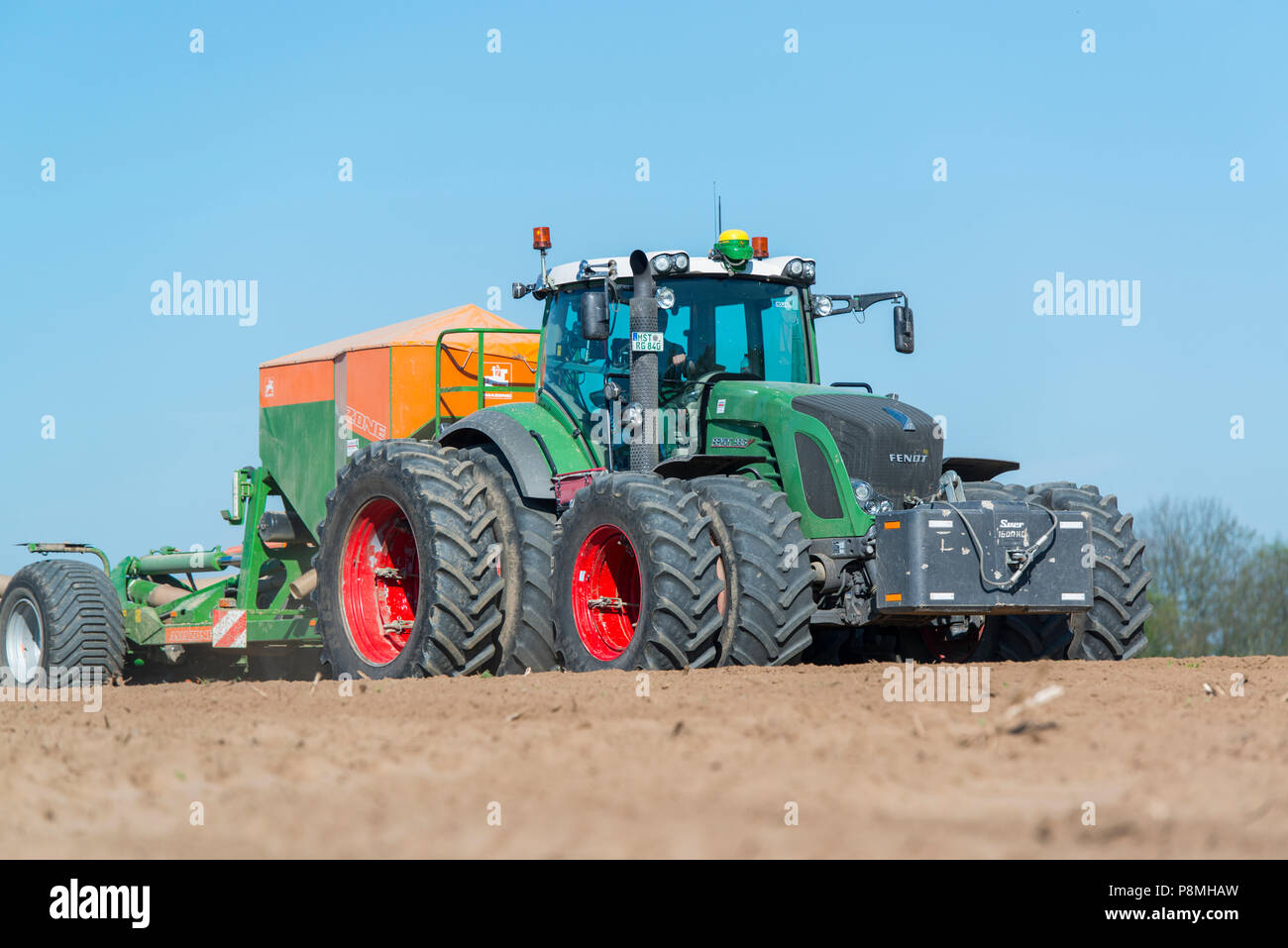 sowing maize in Germany Stock Photo