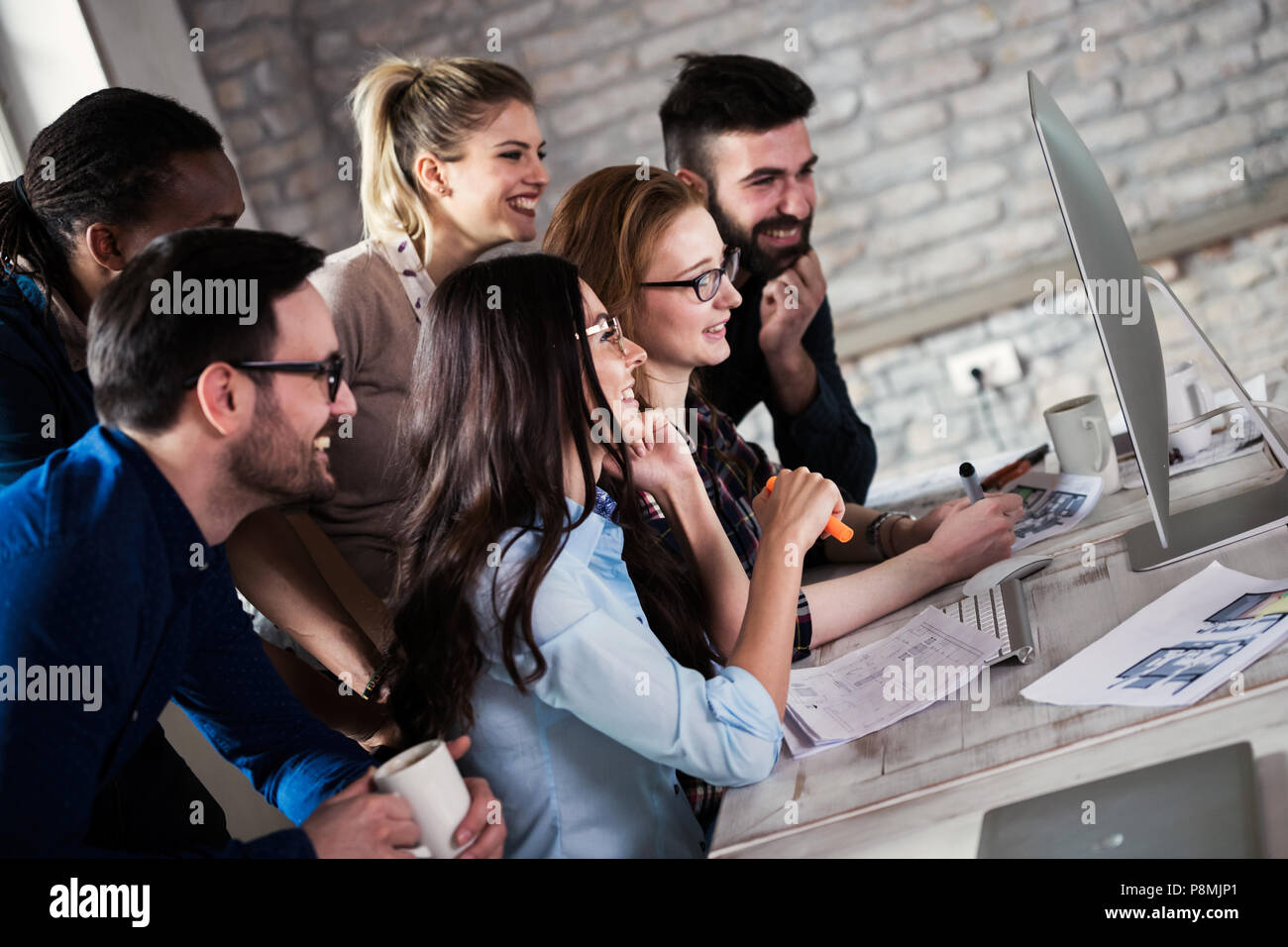 Young architects working on project in office Stock Photo