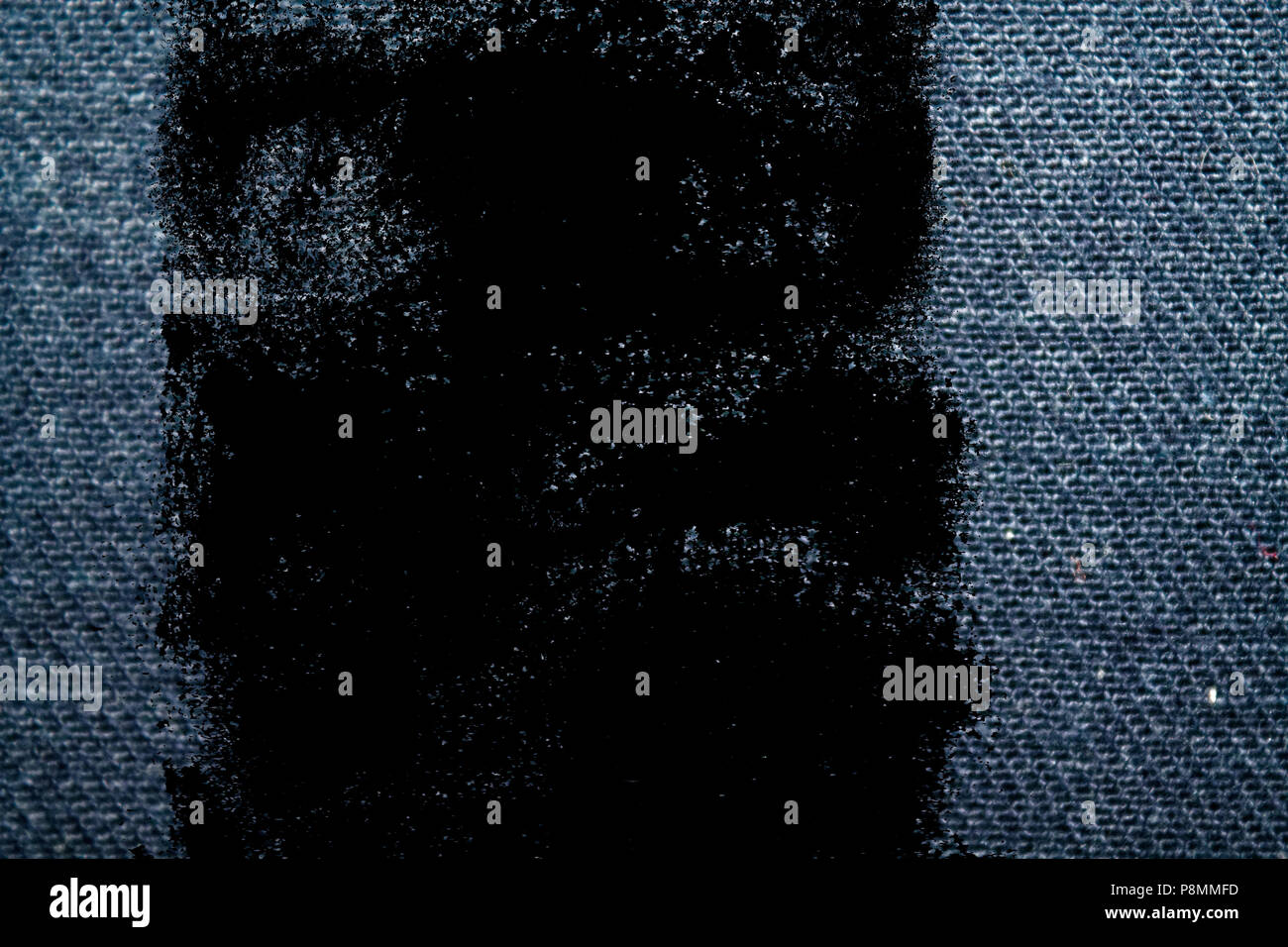 Grunge dirty Blue denim macro texture with seam for jeans background