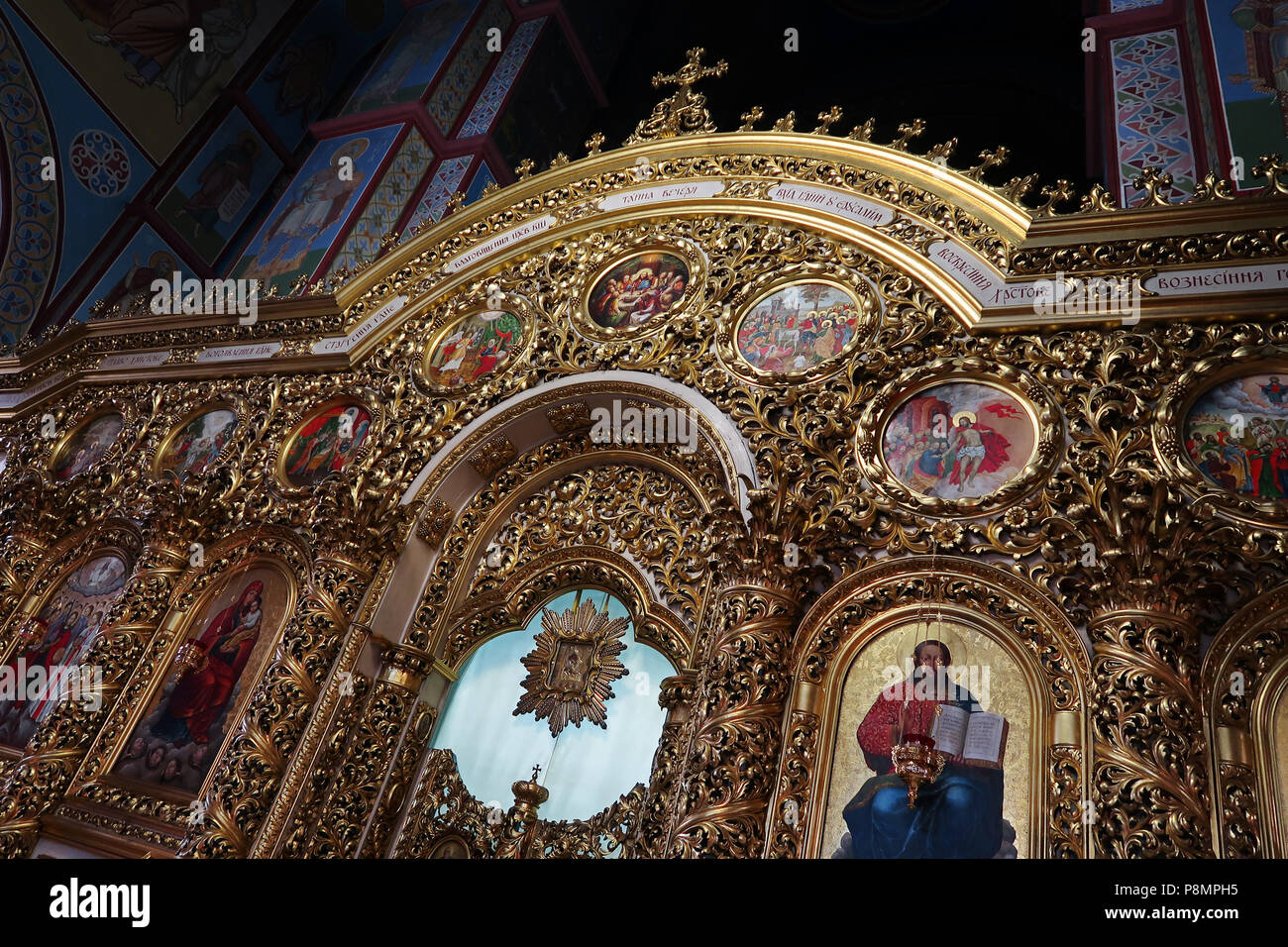 The iconostasis decorated with icons and religious paintings inside St ...