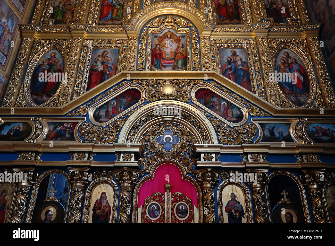 The iconostasis decorated with icons and religious paintings inside St ...