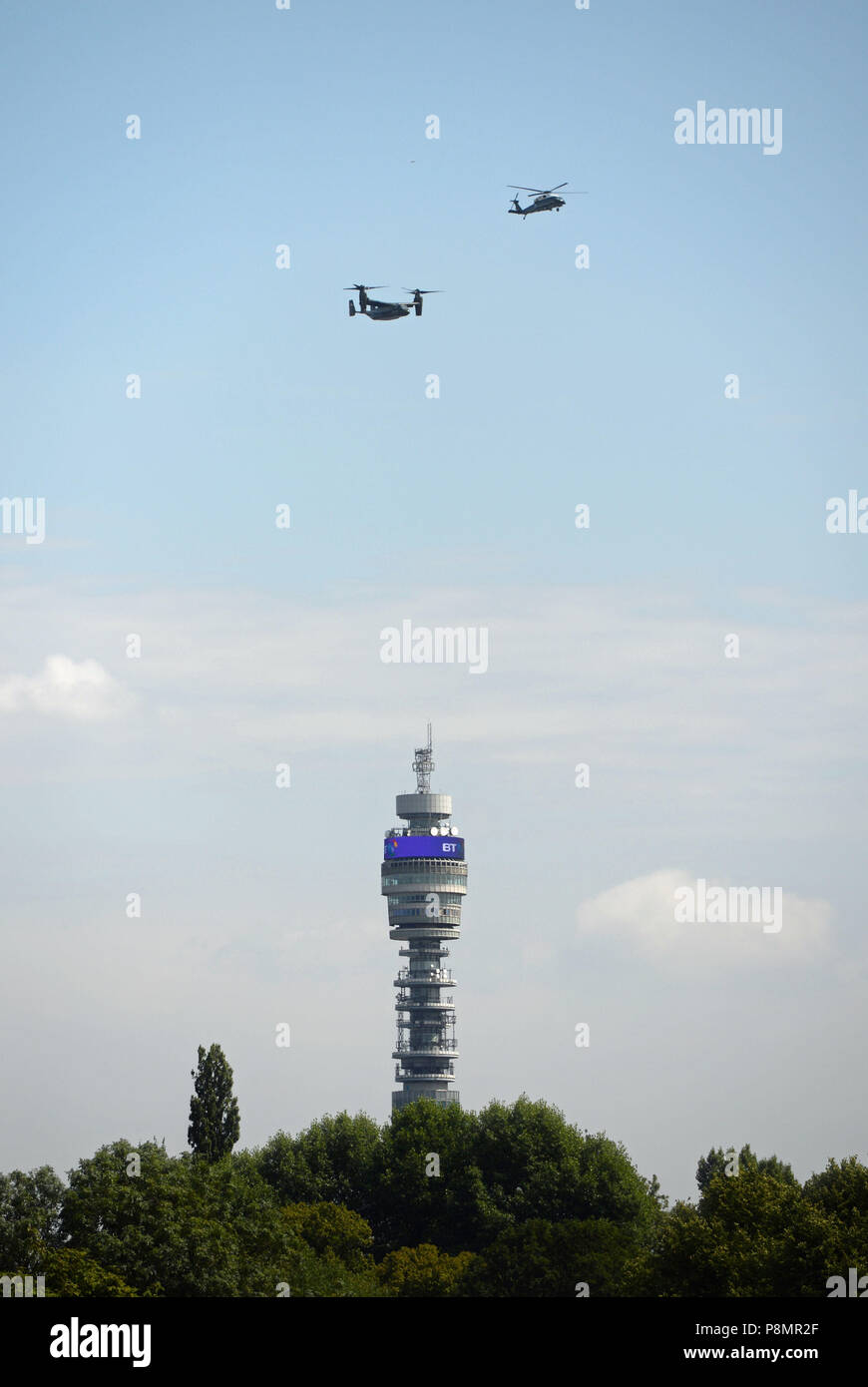 Two US Marine Corps helicopters fly above the Telecom Tower in London as US President Donald Trump travels from Stansted airport to the US ambassador's residence in Regent's Park where he is spending Wednesday night. Stock Photo
