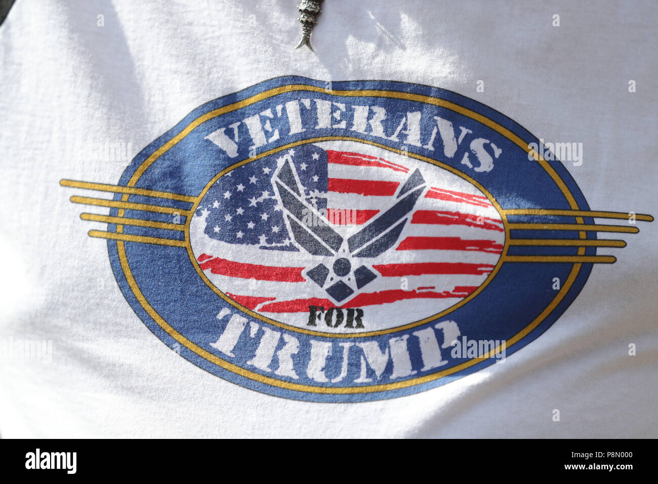 A Trump supporter wears a Veterans for Trump t-shirt outside the entrance to Blenheim Palace, Oxfordshire, ahead of the dinner hosted by Prime Minister Theresa May for US President Donald Trump, as part of his visit to the UK. Stock Photo