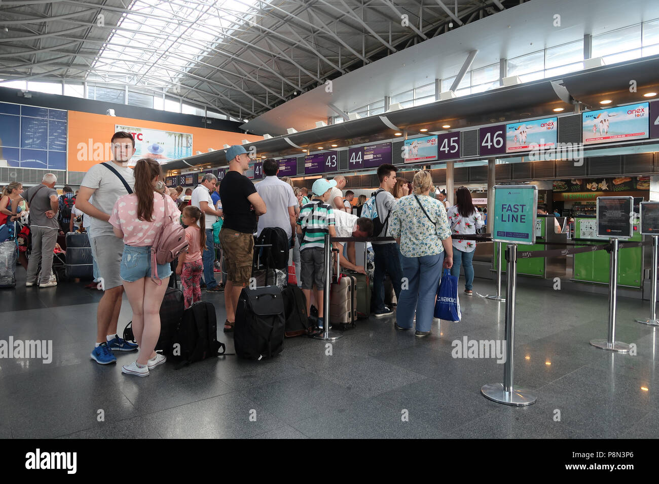 Travelers wait in line to check-in at Boryspil International Airport east of Kiev capital of Ukraine Stock Photo