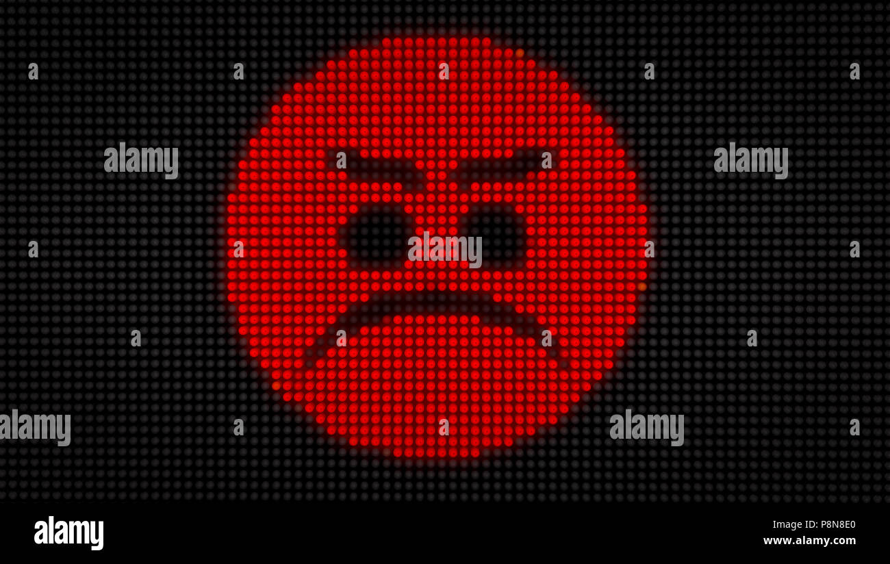 Emoticon angry face on big LED display with large pixels. Bright light
