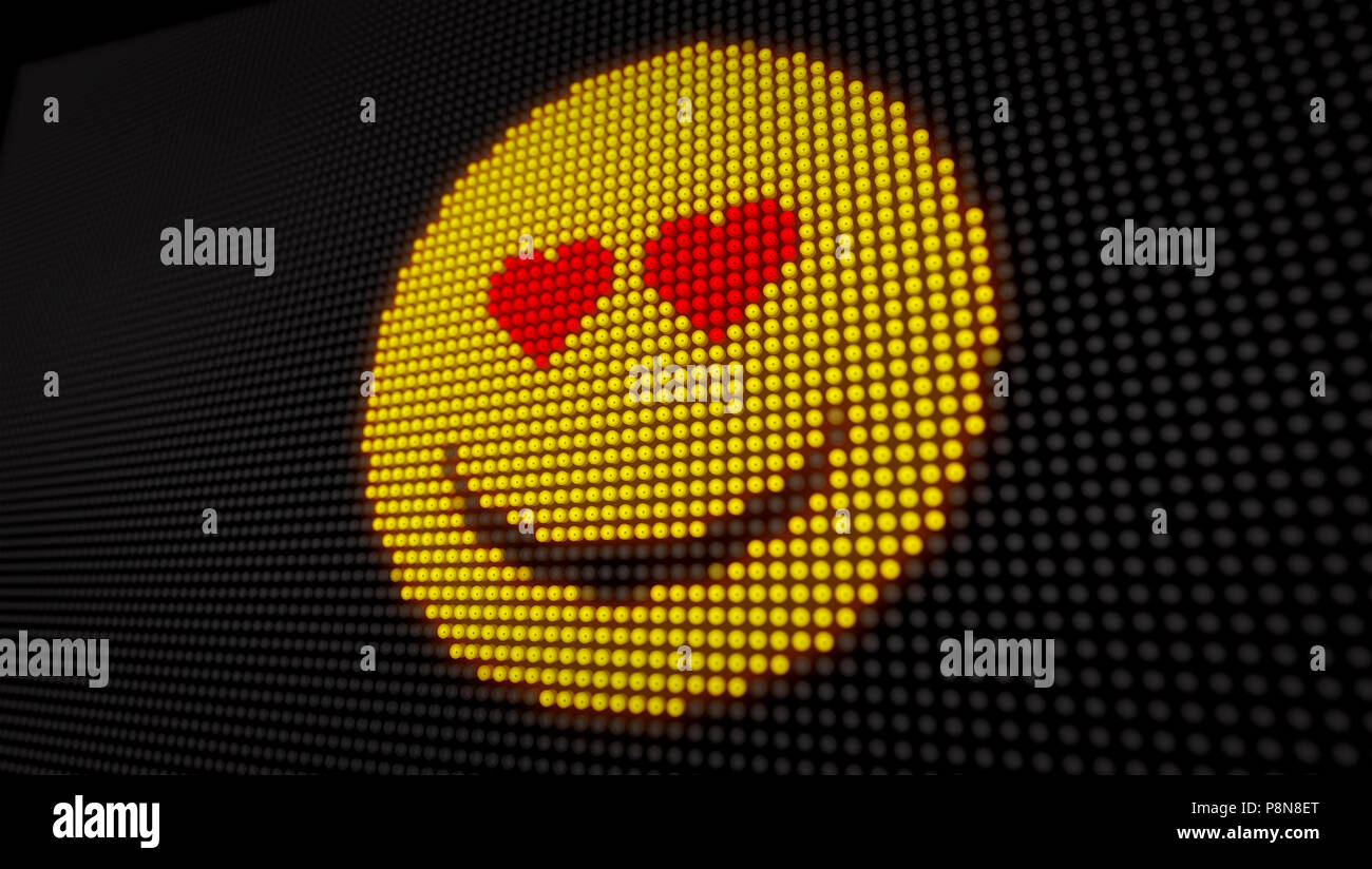 Emoticon love face on big LED display with large pixels. Bright light