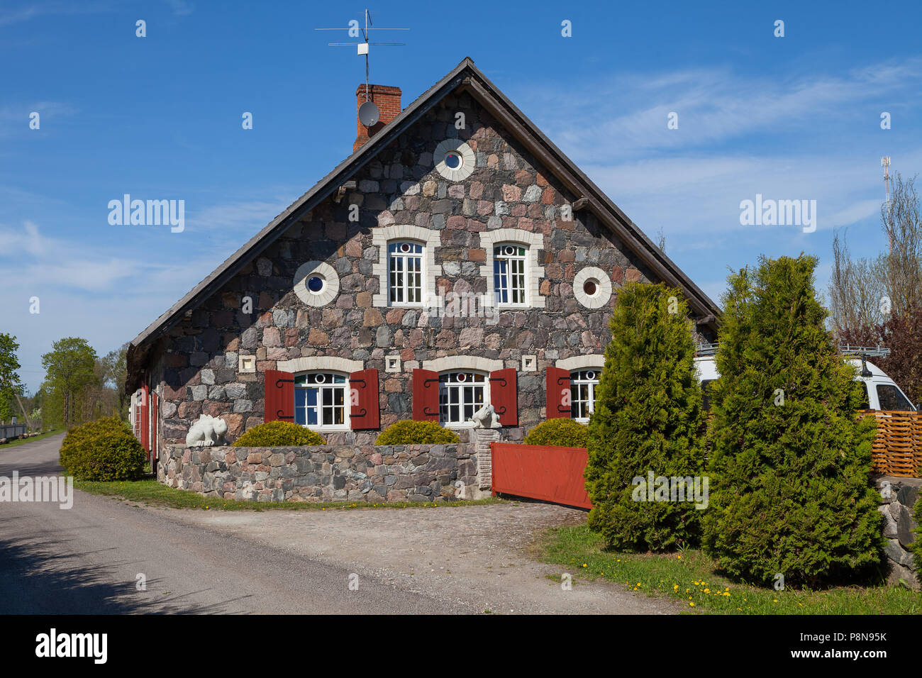Front view of traditional granite house in Estonia Stock Photo