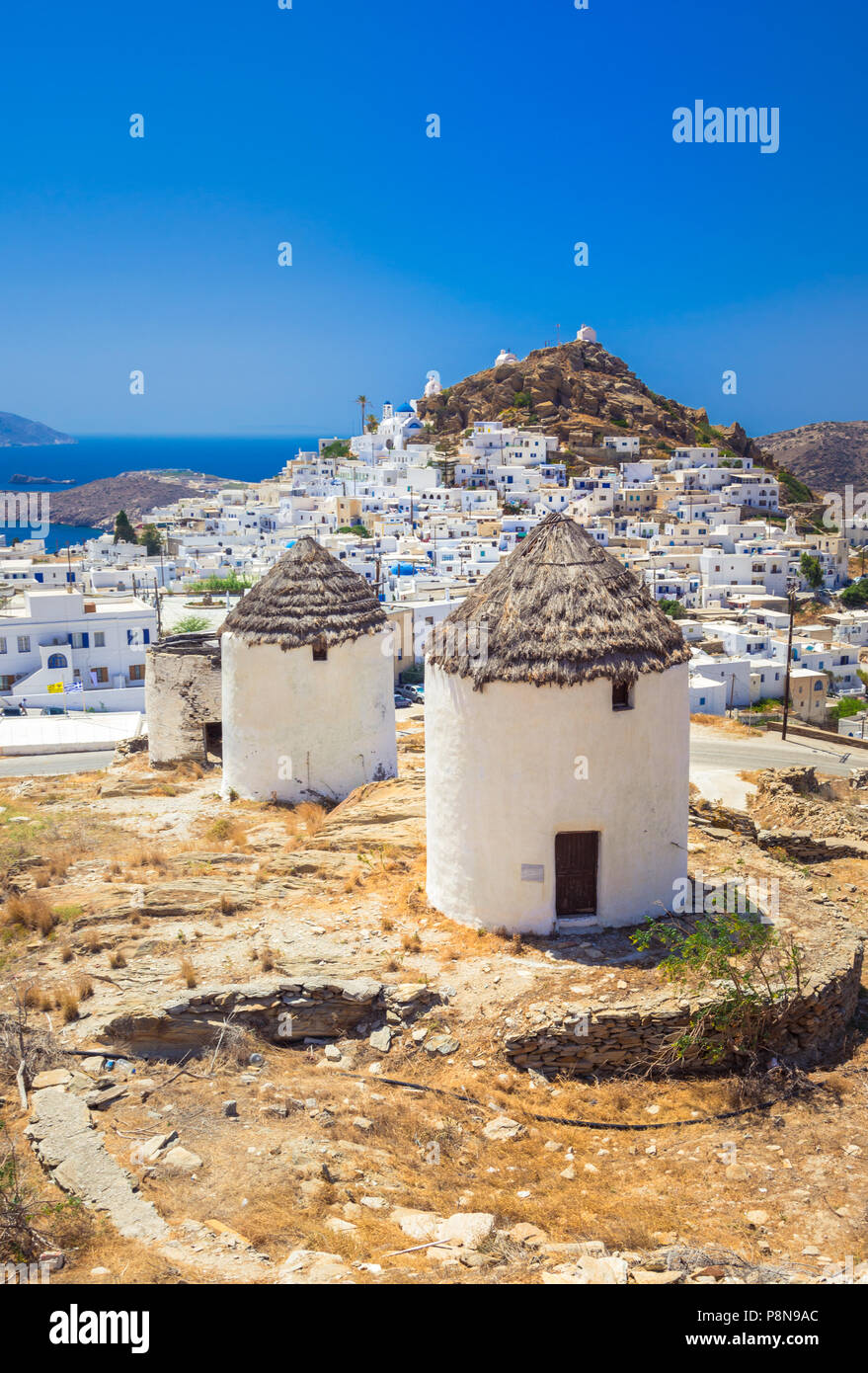 Iconic traditional wind mills in Ios island, Cyclades, Greece Stock ...