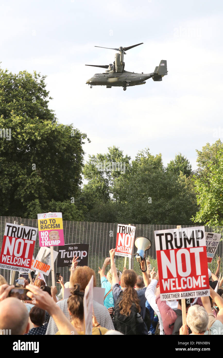 A US presidential helicopter leaves the grounds of the US ambassador residence in Regent's Park, London whilst demonstrators gather as part of the protests against the visit of US President Donald Trump to the UK. Stock Photo