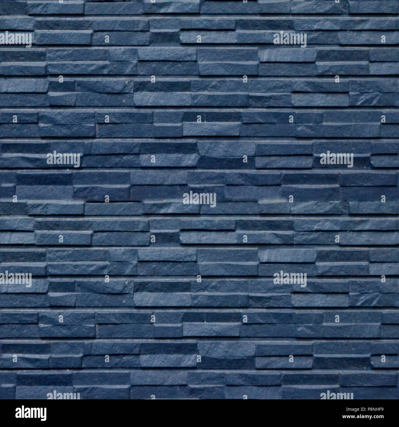 Seamless pattern with blue stone wall panels of the original squared ...