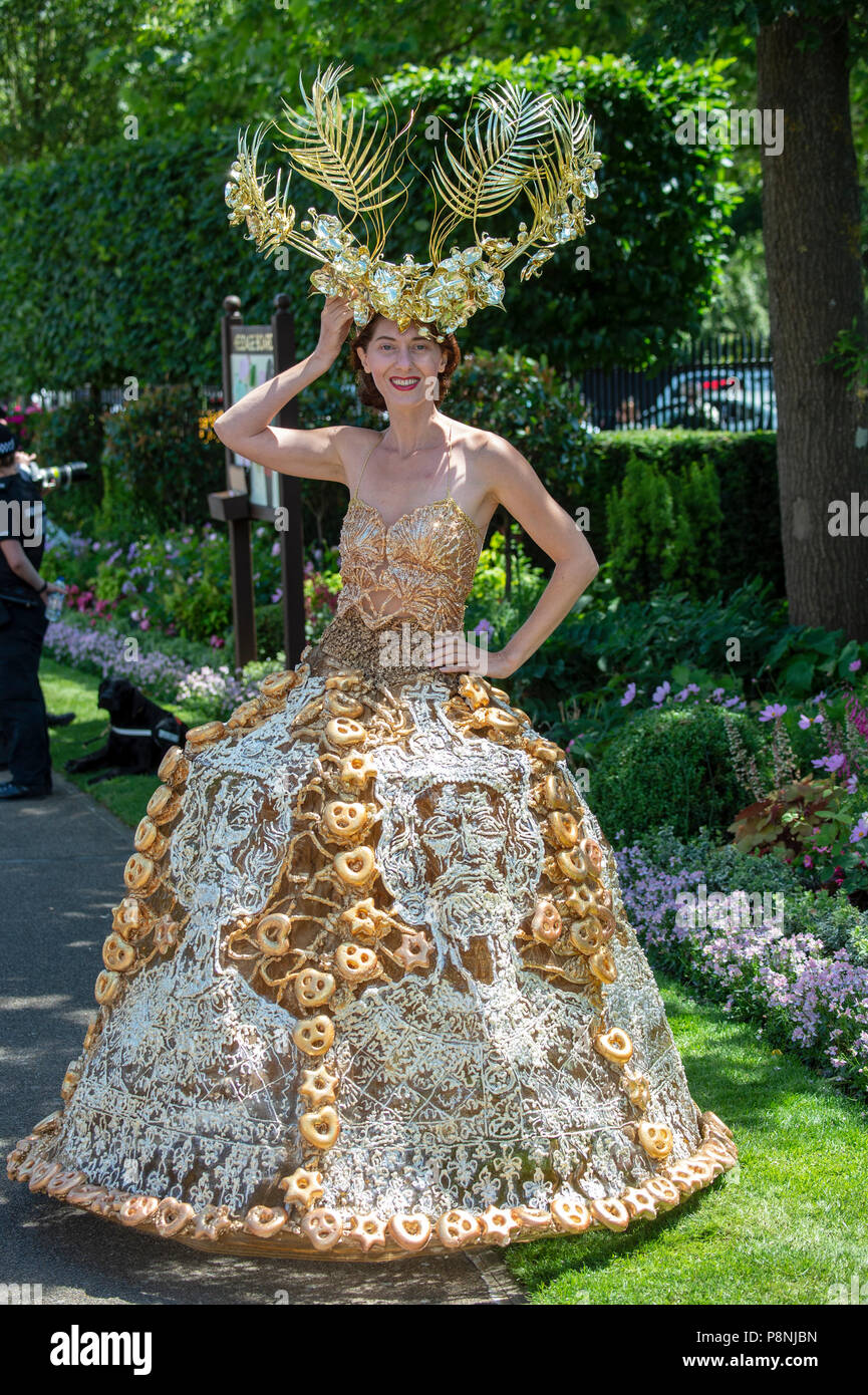 Ladies day at Royal Ascot where racegoers compete with extreme hats and  dresses Stock Photo - Alamy