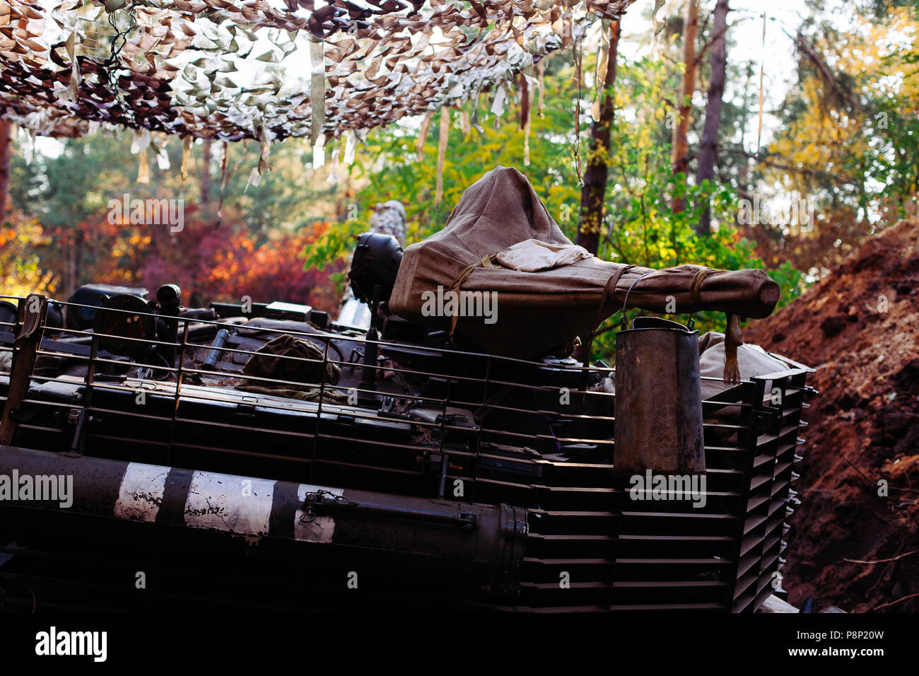 The tank from the hidden position is disguised in the trench Stock ...