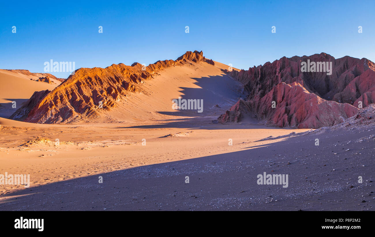 Landscape with long shadows in the Moon valley at sunrise Stock Photo