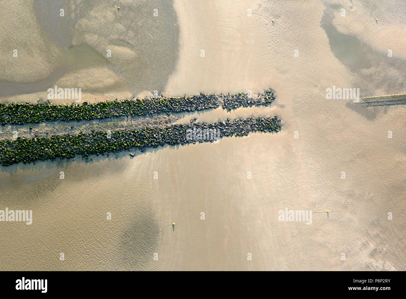 Aerial of a breakwater on the beach Stock Photo