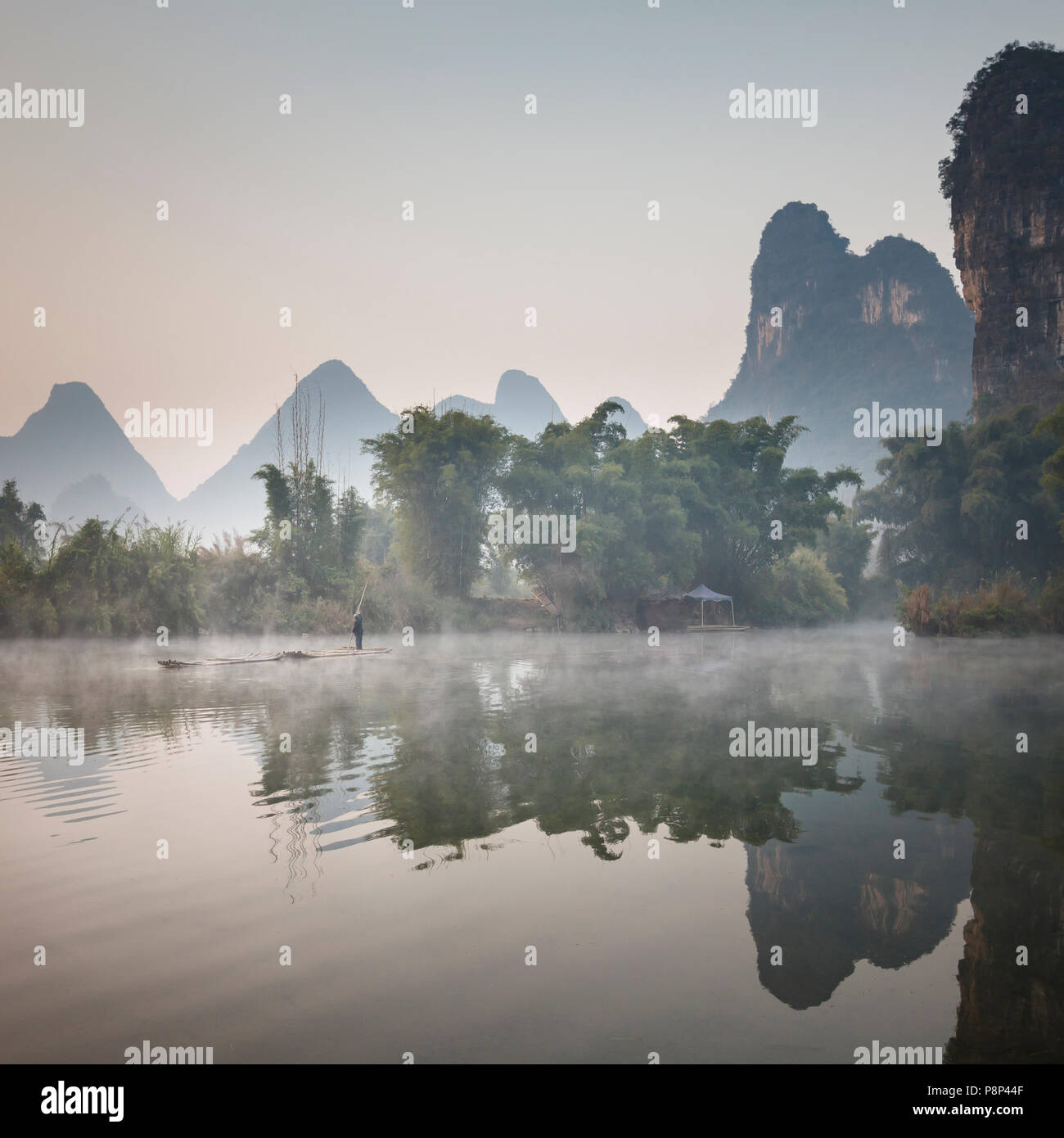 Along the Li River the landscape is dominated by peculiar steep Karst peaks Stock Photo