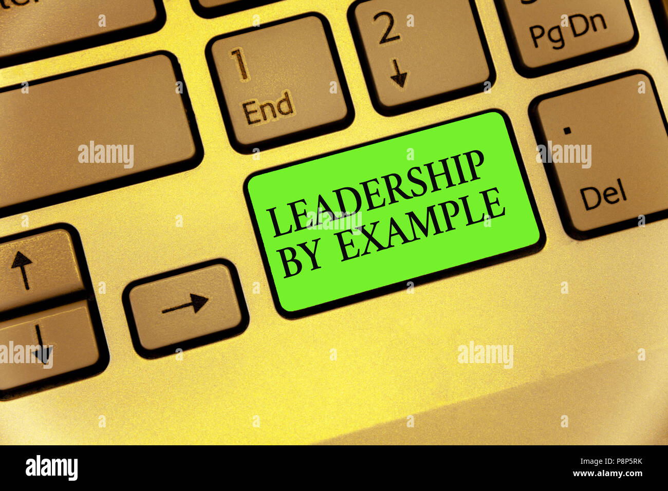 Writing note showing Leadership By Example. Business photo showcasing Becoming role model for people Have great qualities Keyboard button symbol typin Stock Photo