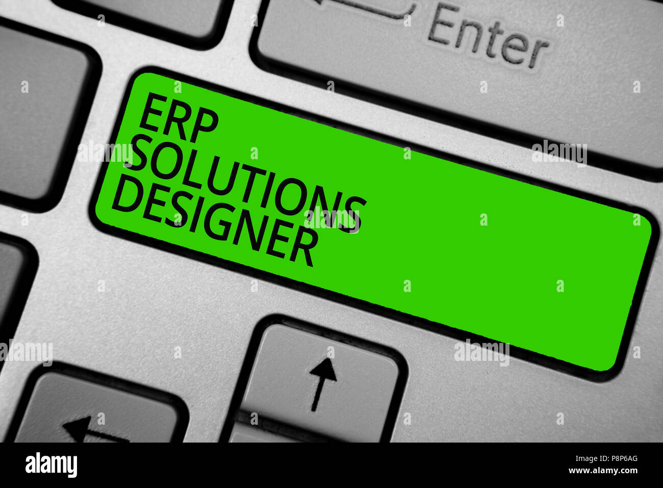 Word writing text Erp Solutions Designer. Business concept for elegant optimized modularised and reusable possible Keyboard green button hit key typin Stock Photo