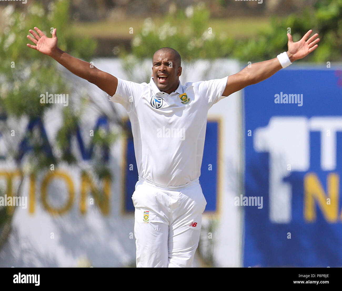 South African cricketer Vernon Philander appeals for a Leg Before Wicket ( LBW) decision against Sri Lankan batsman Dimuth Karunaratne during the  first day of their opening Test match between Sri Lanka and