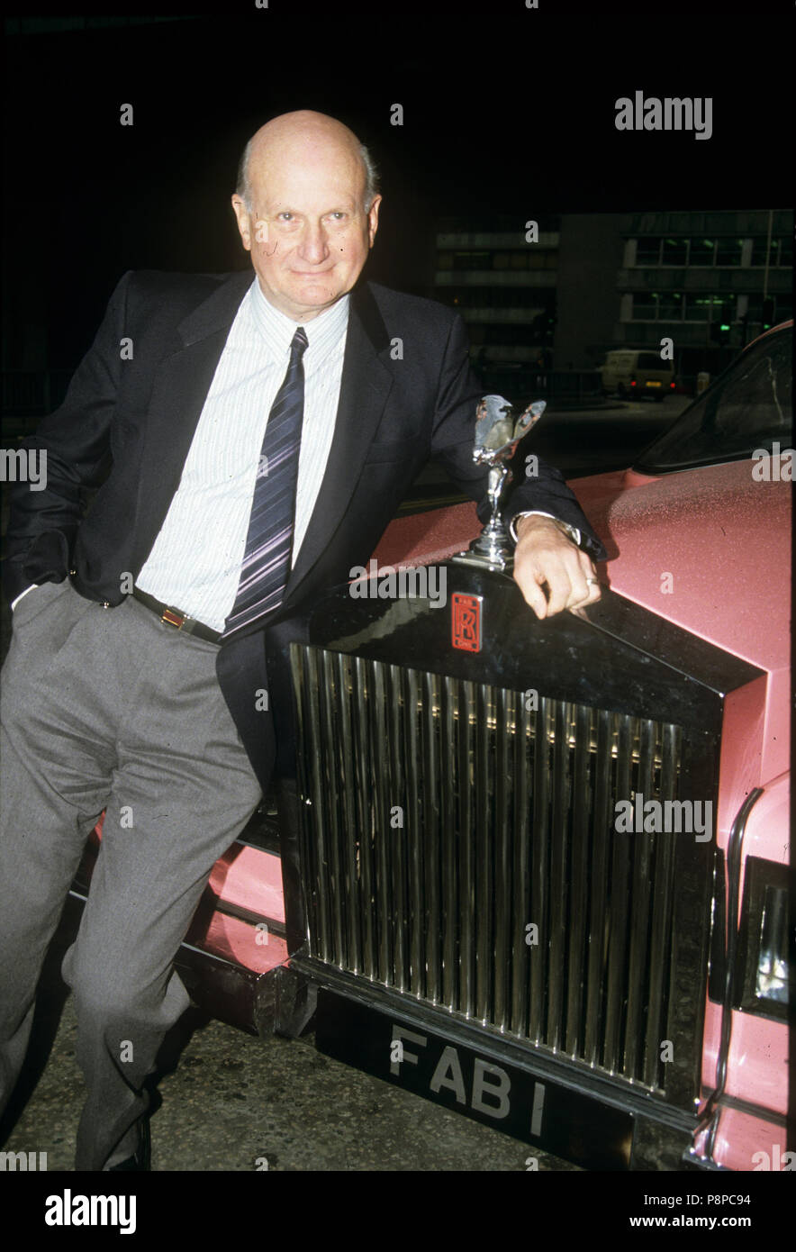 GERRY ANDERSON (1929-2012) English film and TV producer with a model of the pink Rolls Royce from Thunderbirds Stock Photo