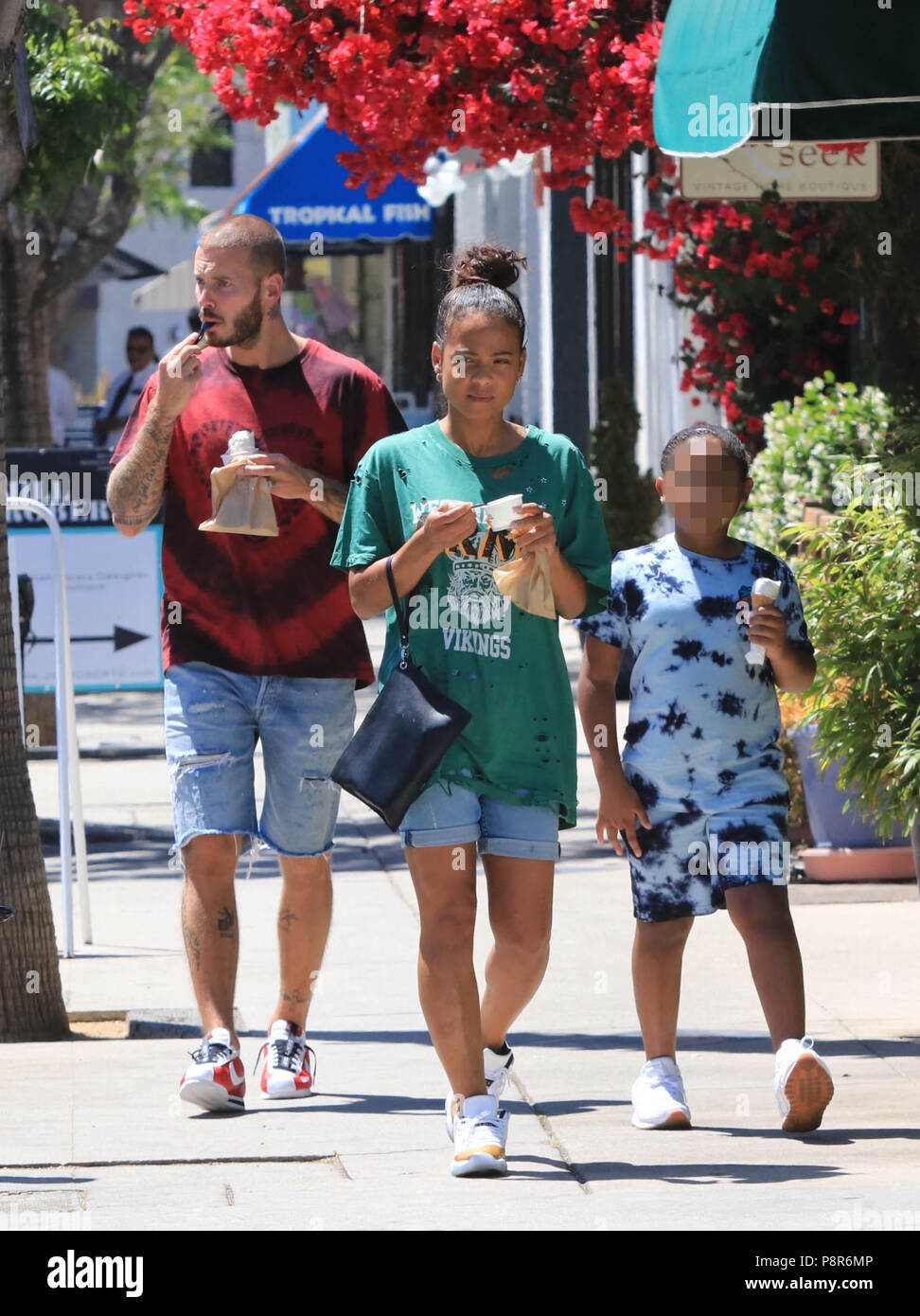 Christina Milian enjoys an ice cream with her daughter Violet and her  boyfriend M. Pokora in Studio City Featuring: Christina Milian, M. Pokora,  Violet Madison Nash Where: Los Angeles, California, United States, image size:972x1390