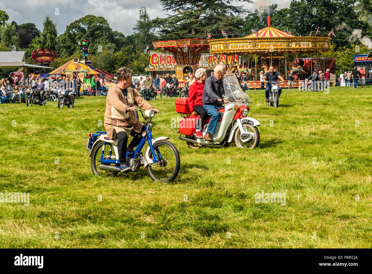 Old Motorcycles on display at Chelford steam rally Cheshire United Kingdom Stock Photo