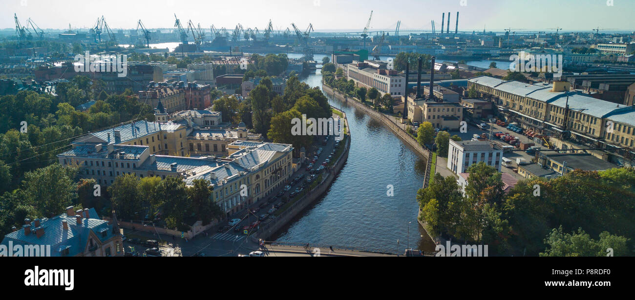 Panoramic view of Saint Petersburg, a lot of loading cranes on the background, drone photo, summer day Stock Photo