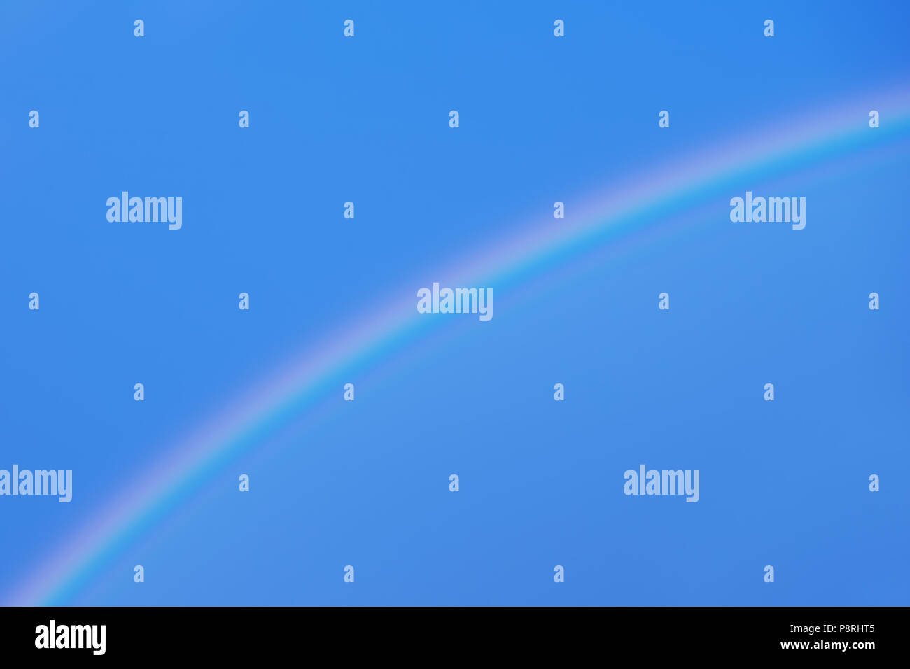Rainbow on blue sky Stock Photo