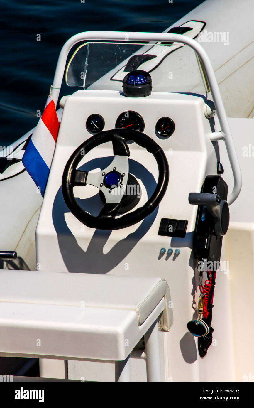 Rudder rubber boat without coxswain with the flag Stock Photo Alamy