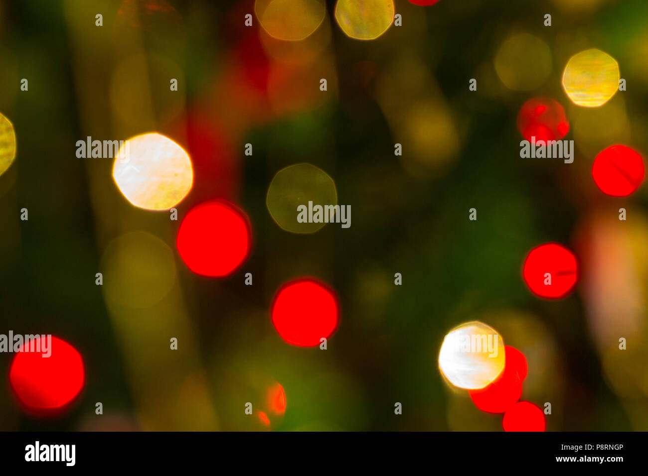 Christmas lights twinkling red and gold blurred lights, ideal for